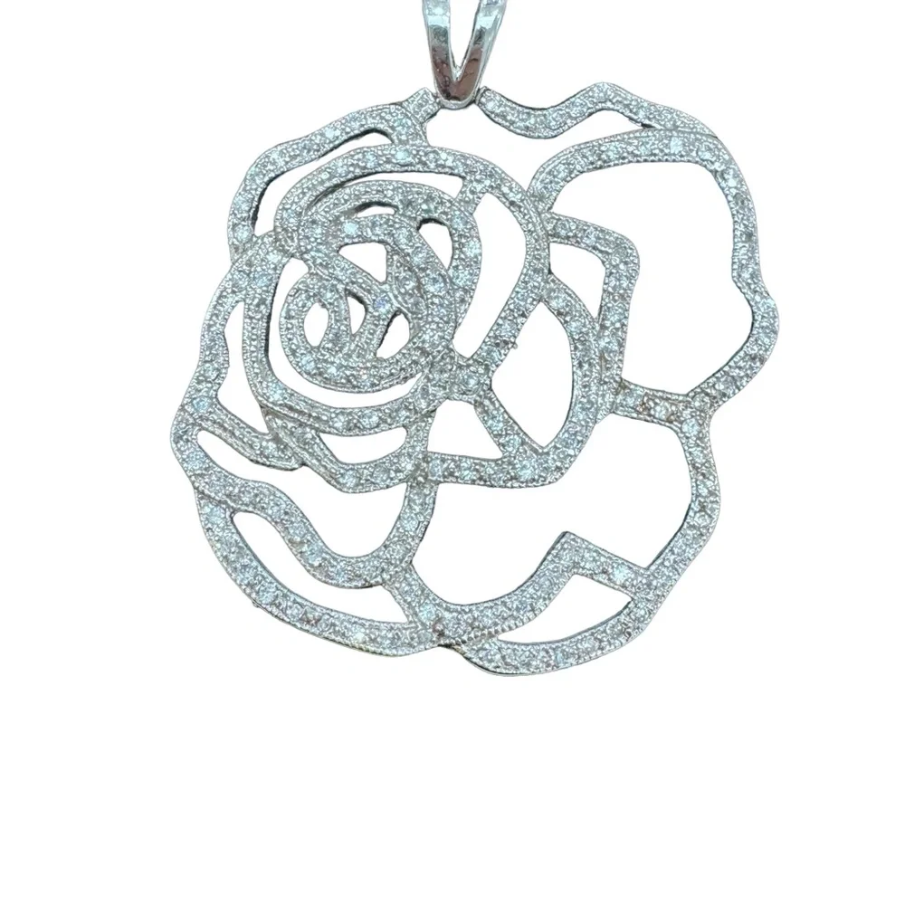 STERLING SILVER OPEN FLOWER PENDANT W MICRO PAVE STONES ON BLACK SUEDE NECKLACE